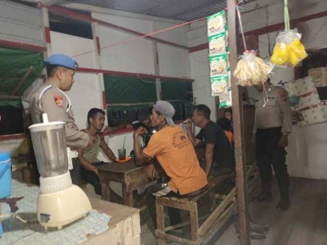 Personel Polsek Enok Gelar  Patroli malam Ciptakan situasi aman terhadap warga