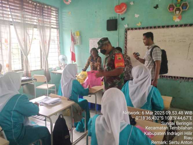 Sertu Anton Lakukan Pendampingan Program MBG di Beberapa Sekolah Lingkup Kota Tembilahan