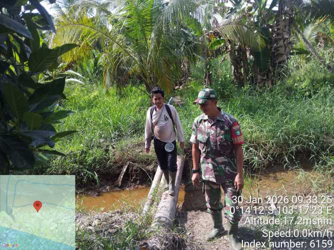 Babinsa Sungai Piring Perkuat Pengamanan Tapal Batas Wilayah