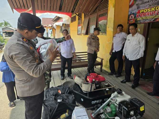 Kapolsek Pelangiran Pimpin Kesiapan dan Pengecekan di Posko Pengendali Karhutla
