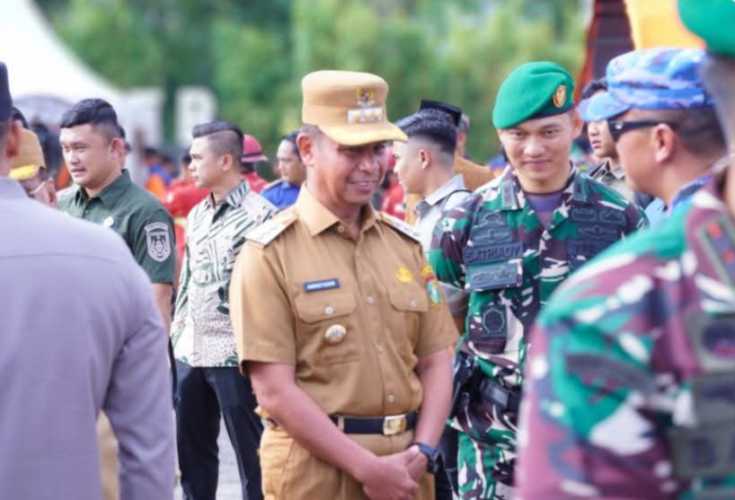 Bupati Kampar Hadiri Apel Kesiapsiagaan Karhutla Riau 2026 di Lanud Roesmin Nurjadin