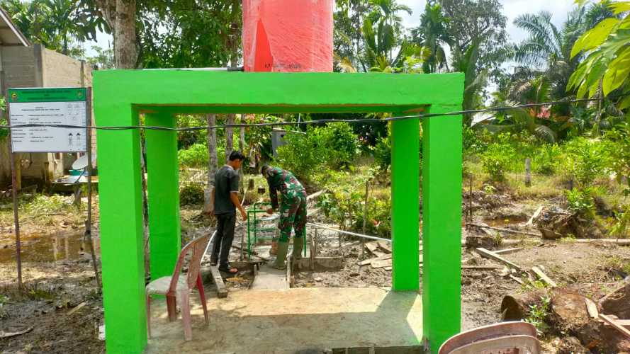 Sumur Bor Program TMMD Ke-123 Kodim 0314/Inhil di Desa Karya Tunas Jaya Resmi Beroperasi