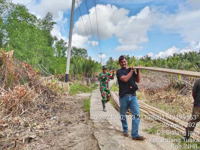 Babinsa Sialang Jaya Implementasikan Percepatan Pembangunan Jembatan Garuda yang Diprogramkan Pemerintah