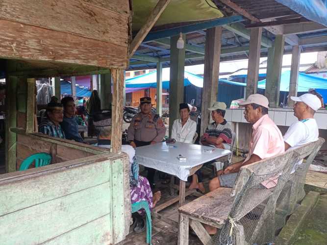 Dalam Ciptakan Cooling System,Kapolsek Sungai Batang Temui Warga di Warung Kopi