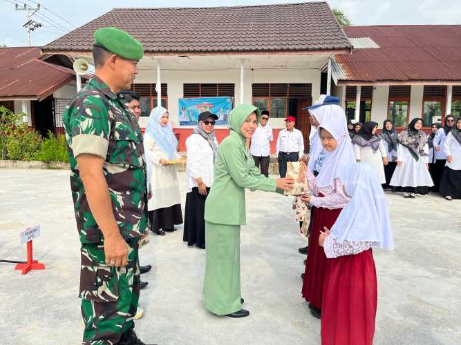 Babinsa dan Persit Batang Tuaka Hadir dalam Peringatan Hari Anak Nasional ke-41