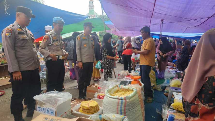 Hari Pencoblosan Semakin Dekat, Kapolsek Kempas Ingatkan Pedagang Pasar