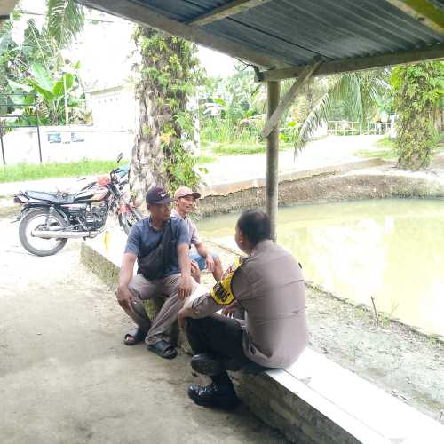 Bhabinkamtibmas Polsek Lima Puluh Laksanakan Sambang dan Cooling System untuk Jaga Harkamtibmas