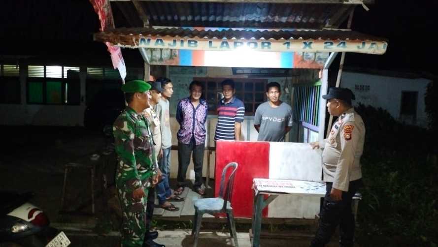Polsek Tempuling dan Koramil 03/ Tempuling Gelar Patroli Bersama Masyarakat Menjaga Negeri