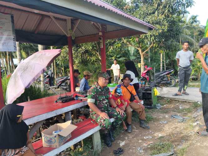 Babinsa Sungai Intan Aktif Jaga Keamanan dan Ketertiban Masyarakat