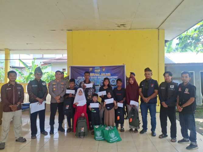Sat Polairud Polres Pelalawan Gandeng Baznas Salurkan Bantuan Melalui Program JALUR Kapolda Riau di Wilayah Kecamatan Teluk Meranti.