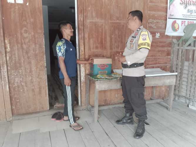 Bhabinkamtibmas Desa Teluk Merbau Memberikan Himbauan Kepada Masyarakat Agar Tetap Waspada Dengan Pendatang Baru