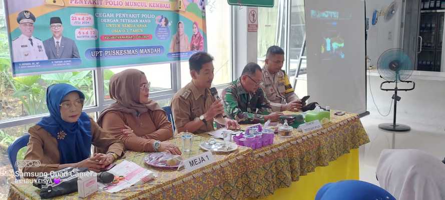 Danramil Mandah Hadiri Pekan Imunisasi  Polio Secara Vidcon