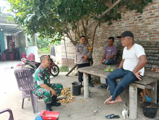 Bhabinkamtibmas Polsek Lima Puluh Laksanakan Sambang dan Cooling System untuk Jaga Harkamtibmas