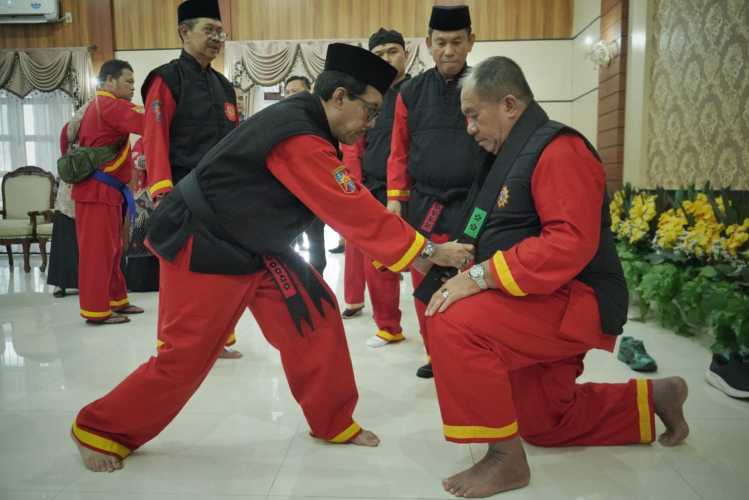 Momentum Milad Muhammadiyah Ke-113, Tapak Suci Kukuhkan Bupati Asahan sebagai Pendekar Madya