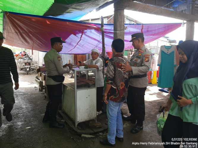 Polsek Kempas Patroli dan Sambang Pasar Tradisional, Ciptakan Kamtibmas Kondusif Usai Pilkada dan Jelang Nataru.