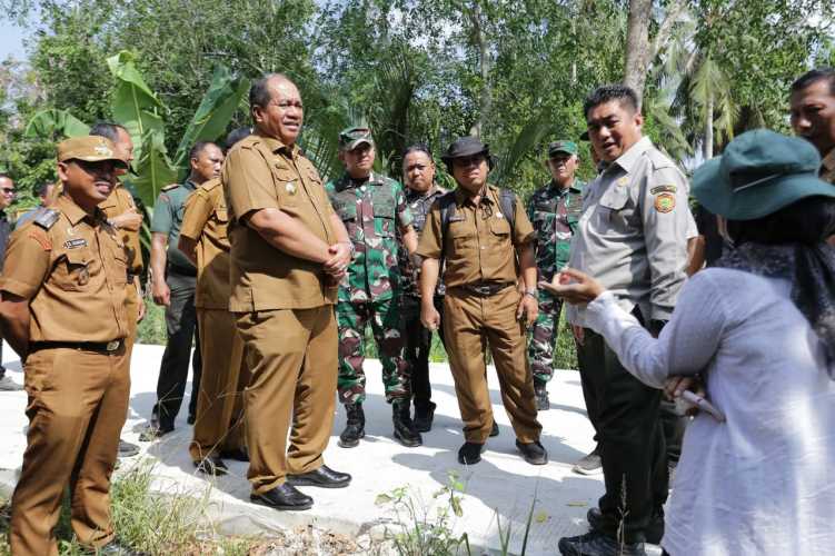 Komandan Kodim 0208/Asahan mendampingi Bupati Asahan pada Kunjungan Kerja Plt Dirjen Perkebunan Kementan RI Tinjau Lokasi Cetak Sawah di Desa Silo Bonto