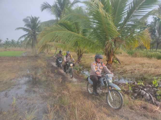 Meski Cuaca Tak Bersahabat dan Kondisi Jalan Licin,Kaposlek Sungai Batang Gencar Patroli dalam Rangka Cooling System