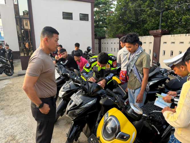 Polres Inhil Tertibkan Balap Liar di Jalan Telaga Biru Parit 8, 14 Sepeda Motor Diamankan