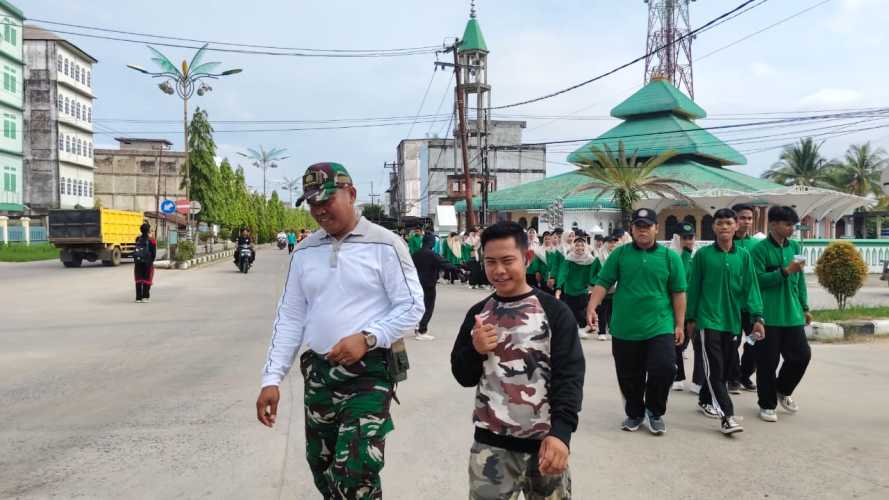 Babinsa Tembilahan Barat Hadiri Jalan Santai Dies Natalis Ke-25 STAI Auliaurrasyidin