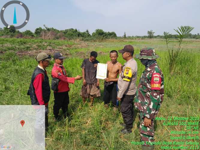 Babinsa dan Babinkamtibmas Sosialisasikan Maklumat Peringatan Karhutlah