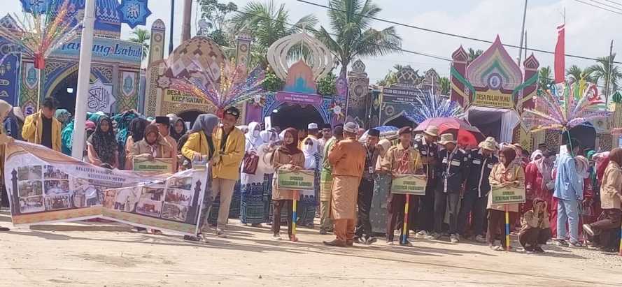 Di Tengah Terik Matahari, Pawai Taaruf MTQ Ke -50 Kecamatan Reteh di Laksanakan dengan Meriah