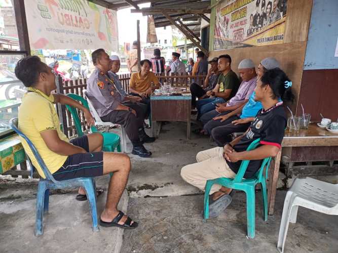 Senantiasa Mengingatkan Warga Menjaga Kamtibmas, Kapolsek Sungai Batang Lakukan Cooling System