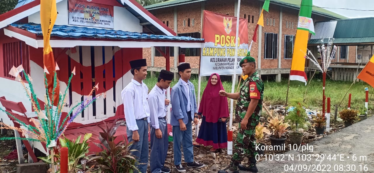 Kopda J.Manurung Babinsa Koramil 10/Pelangiran Berikan  Materi Wasbang