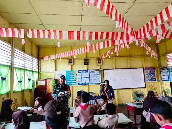 Babinsa Serda Miskal Distribusikan 5.740 porsi Program Makan Bergizi Gratis